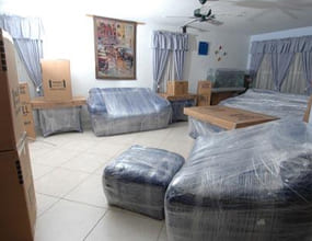 Furniture wrapped in protective film