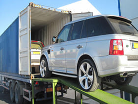 Car loaded in a carrier